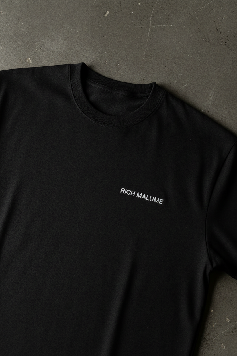 RICH MALUME Black Tee - Flat Lay